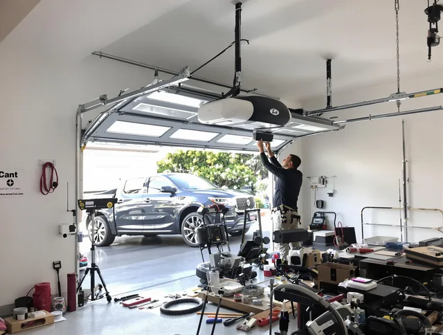 Rocky River Garage Door Repair specialist installing smart garage door opener system in Rocky River home