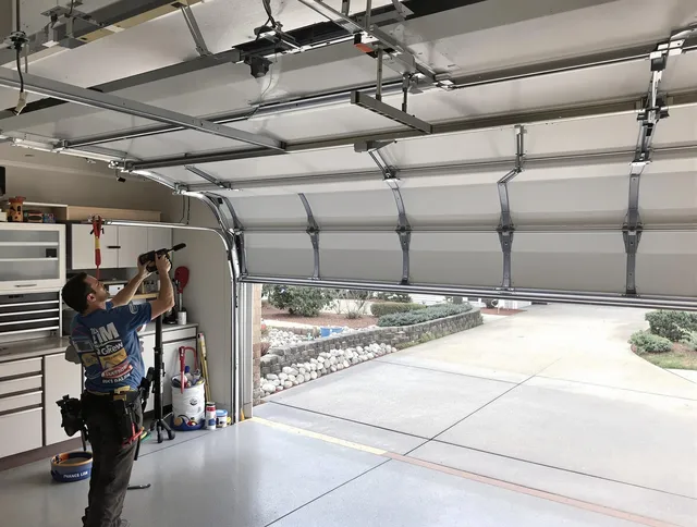 Garage door track repair service by Rocky River Garage Door Repair in Rocky River